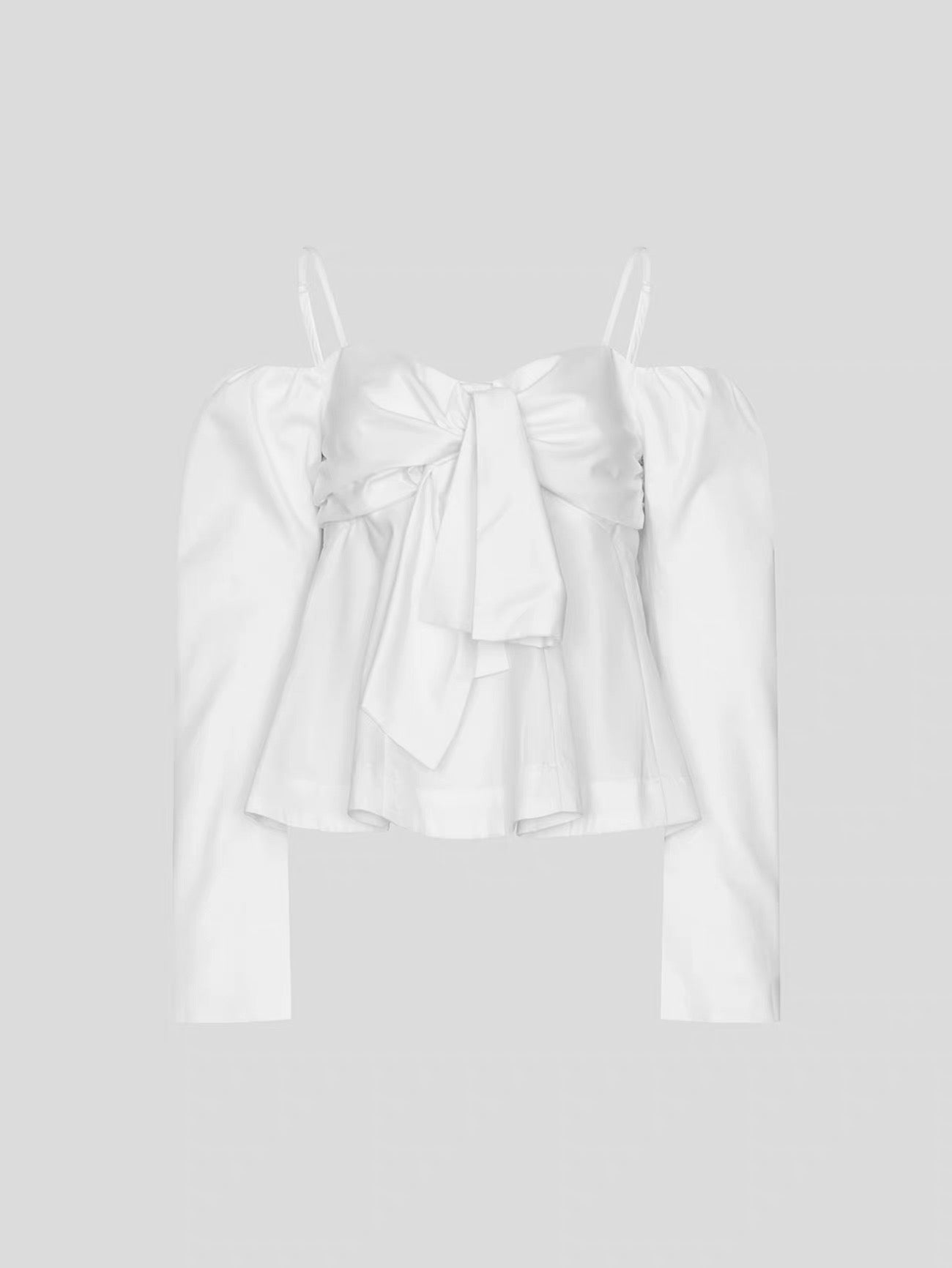 white blouse with a large front bow