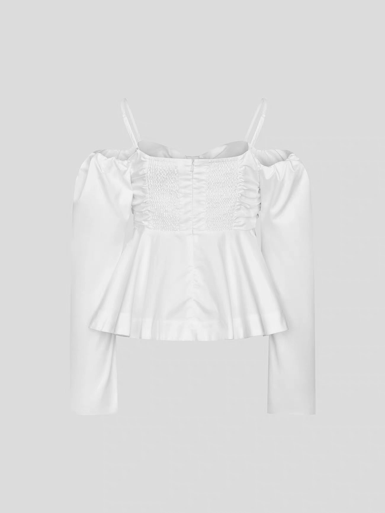 white blouse with a large front bow