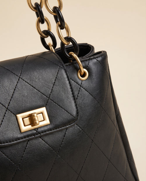 Black Quilted Chain Shoulder Bag in Black — detail close-up