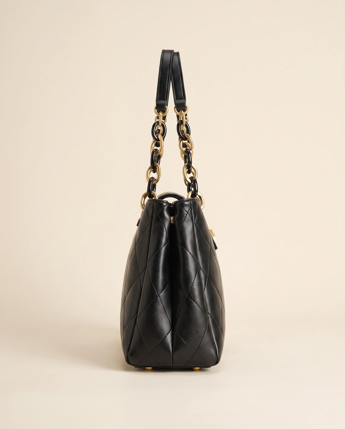Black Quilted Chain Shoulder Bag in Black — side view