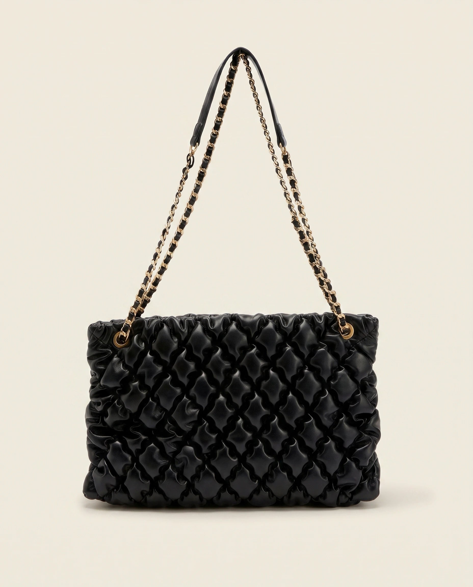 Black Quilted Ruched Cloud Shoulder Bag in Black — front view