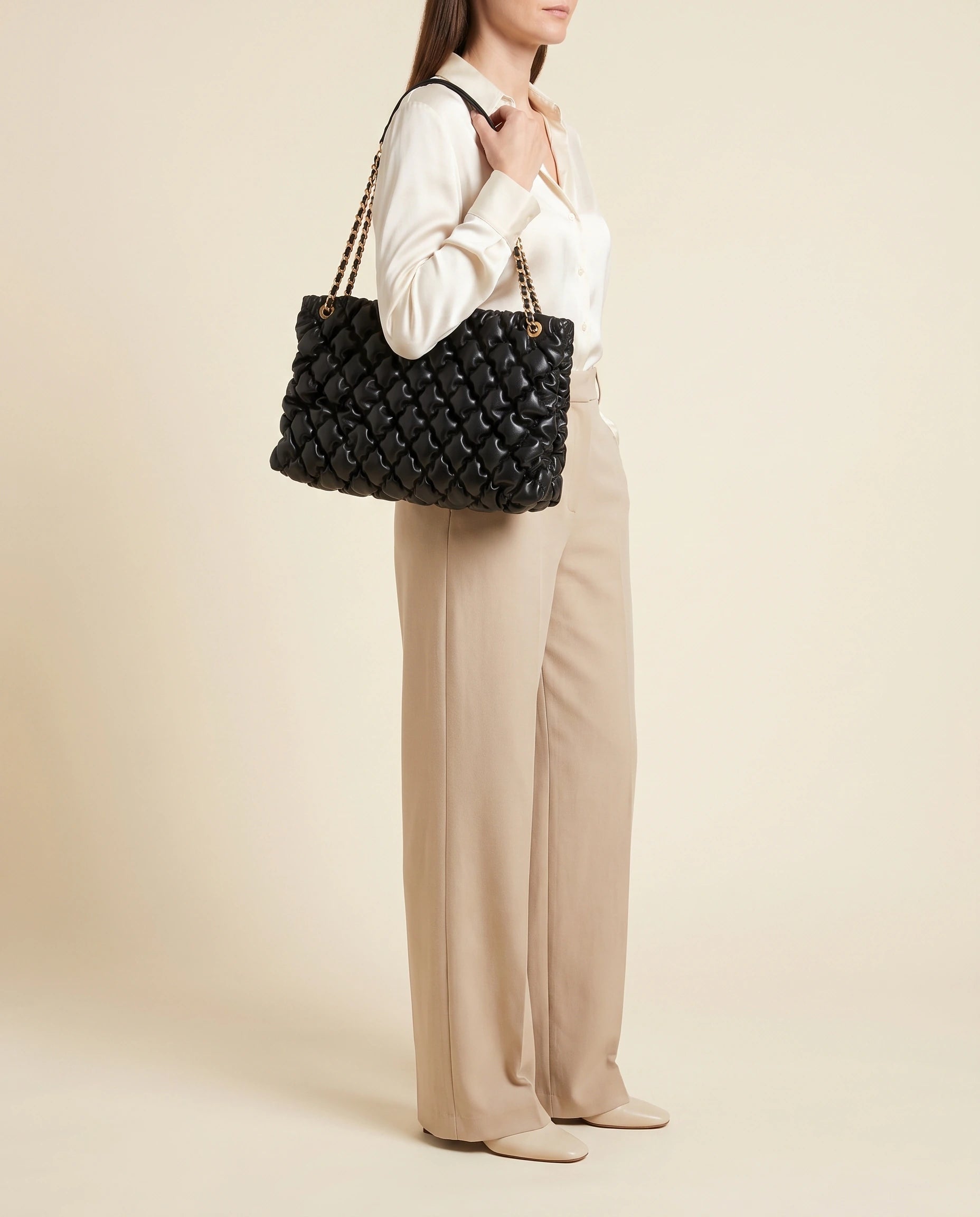 Black Quilted Ruched Cloud Shoulder Bag in Black — worn by model