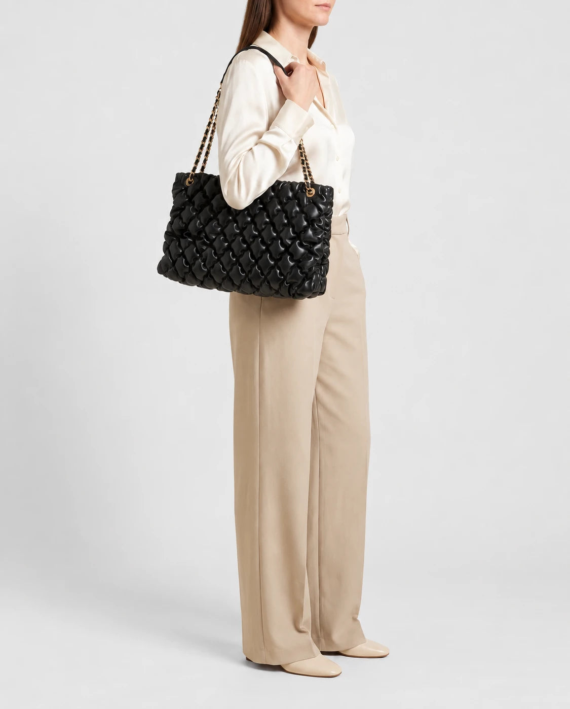 Black Quilted Ruched Cloud Shoulder Bag in Black — worn by model