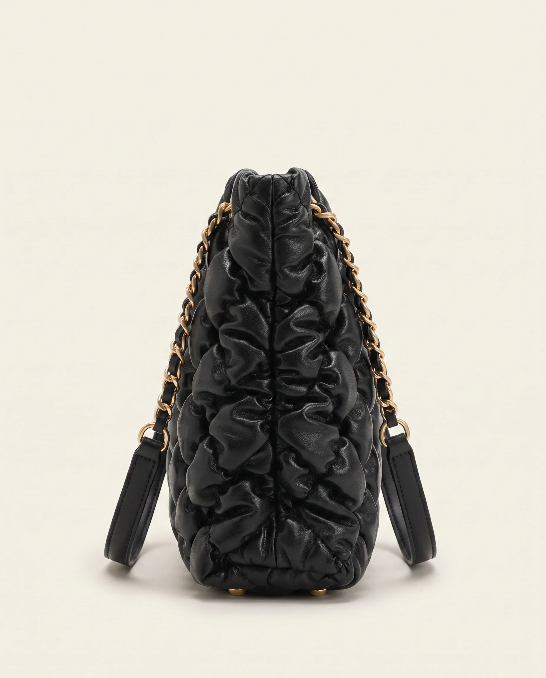 Black Quilted Ruched Cloud Shoulder Bag in Black — side view