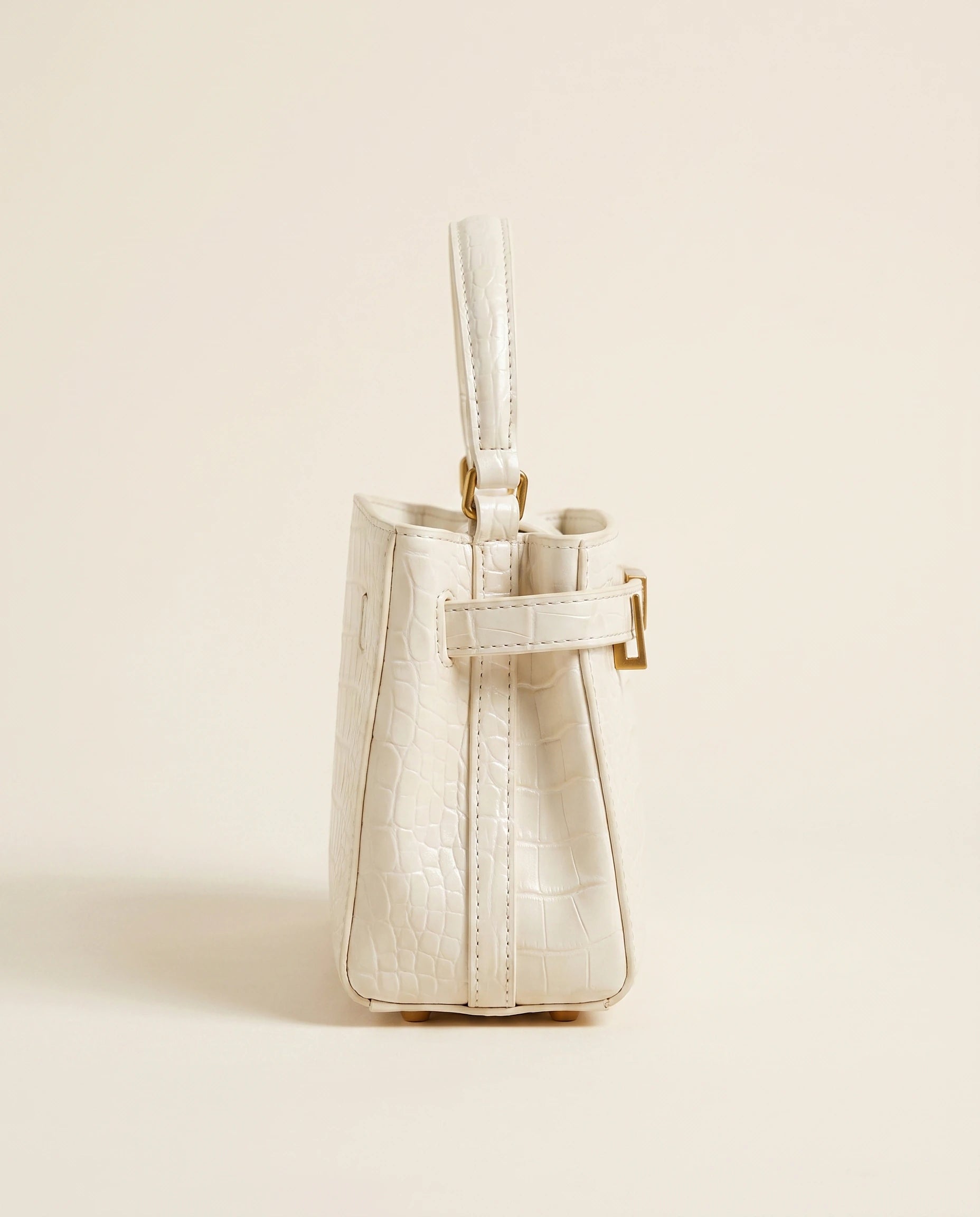 Crocodile Embossed Structured Handbag in White — side view