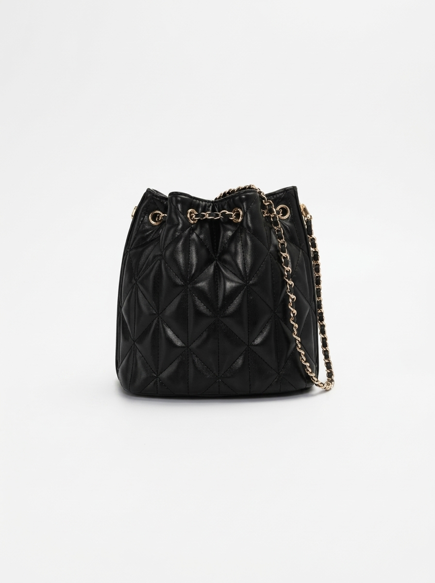 Manon Quilted Bucket Bag — closure and hardware detail