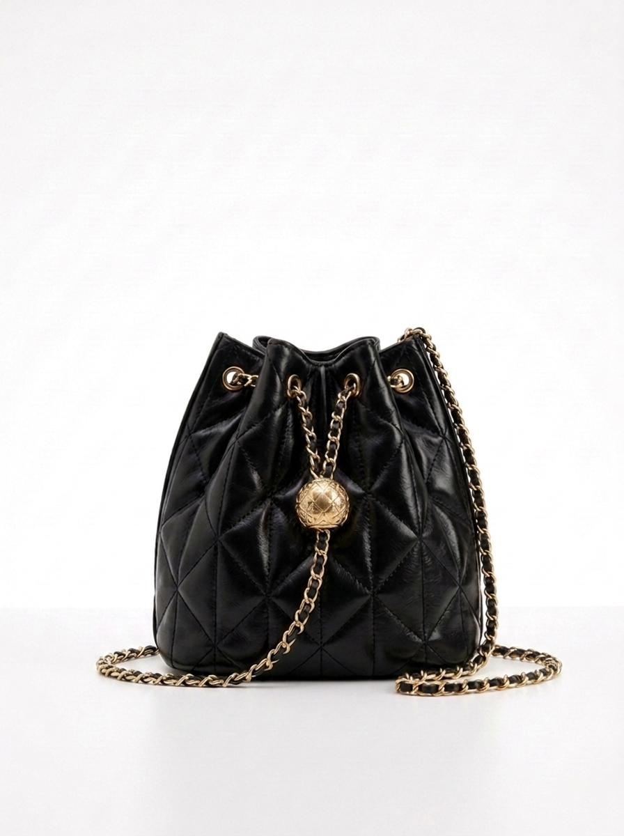 Manon Quilted Bucket Bag — front view