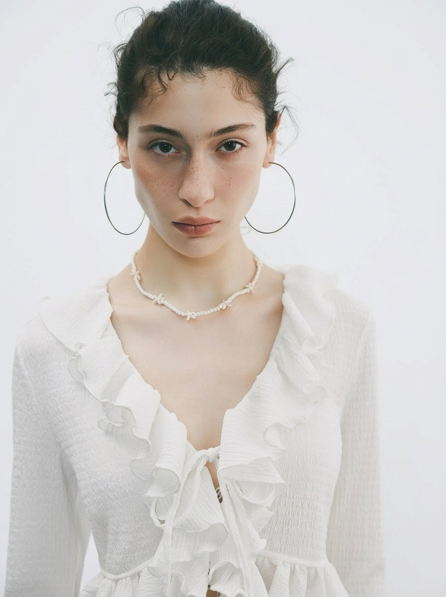White Lotus Leaf Ruffle Trumpet Sleeve Blouse