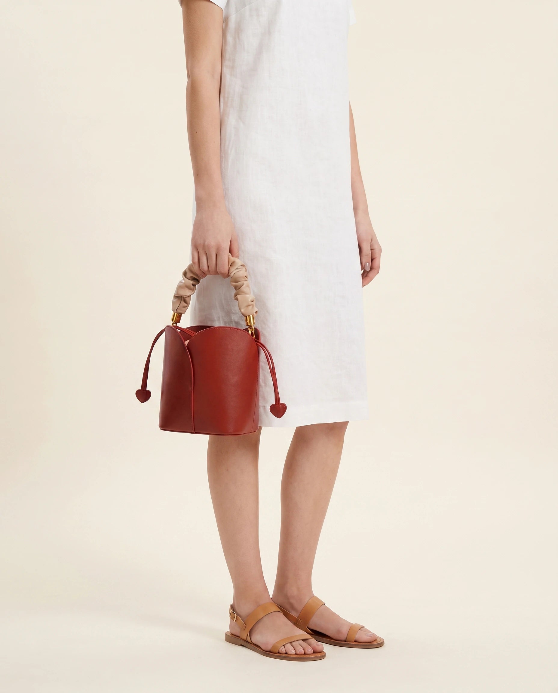 Red Vintage Bucket Bag in Red Whine — worn by model