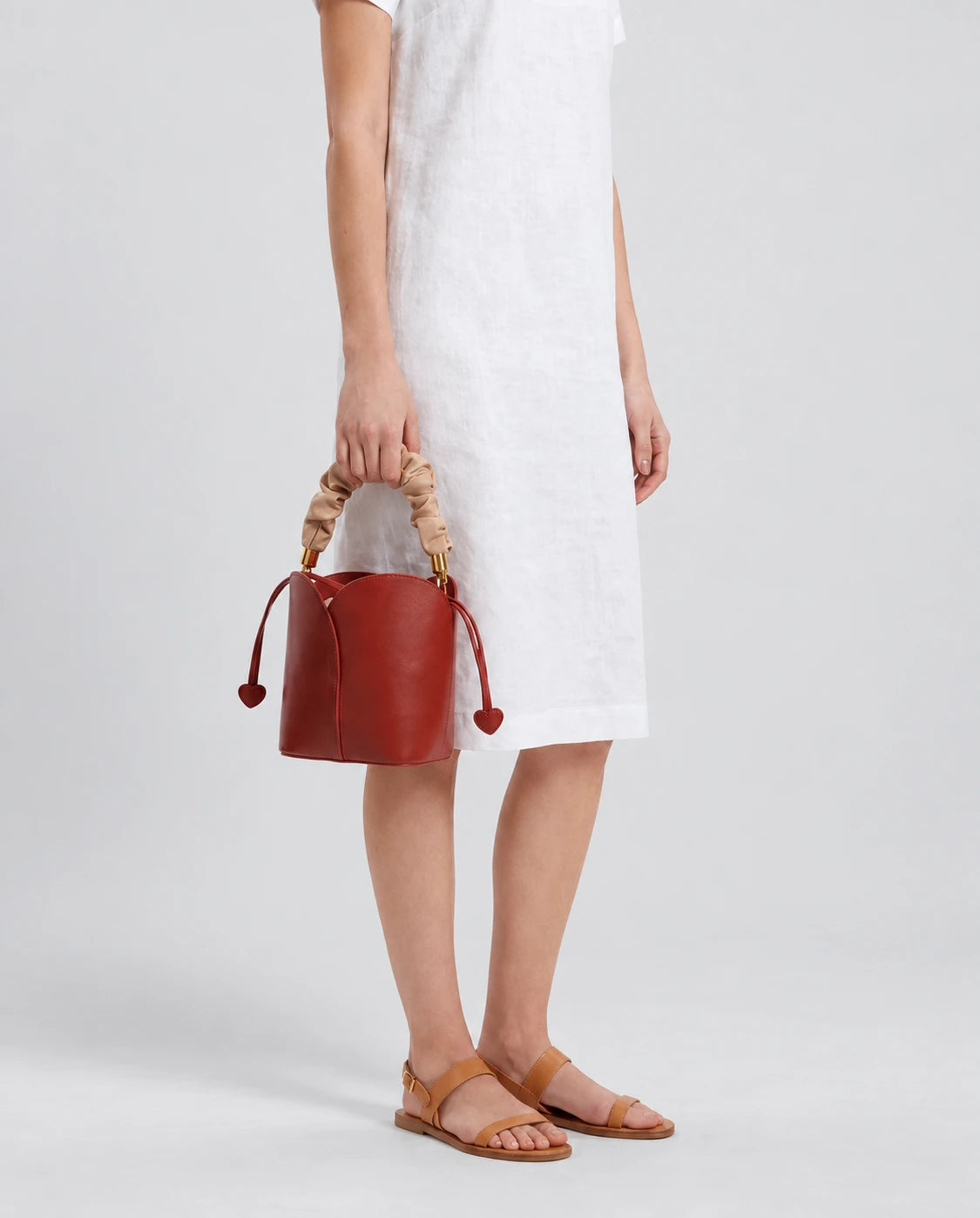 Red Vintage Bucket Bag in Red Whine — worn by model